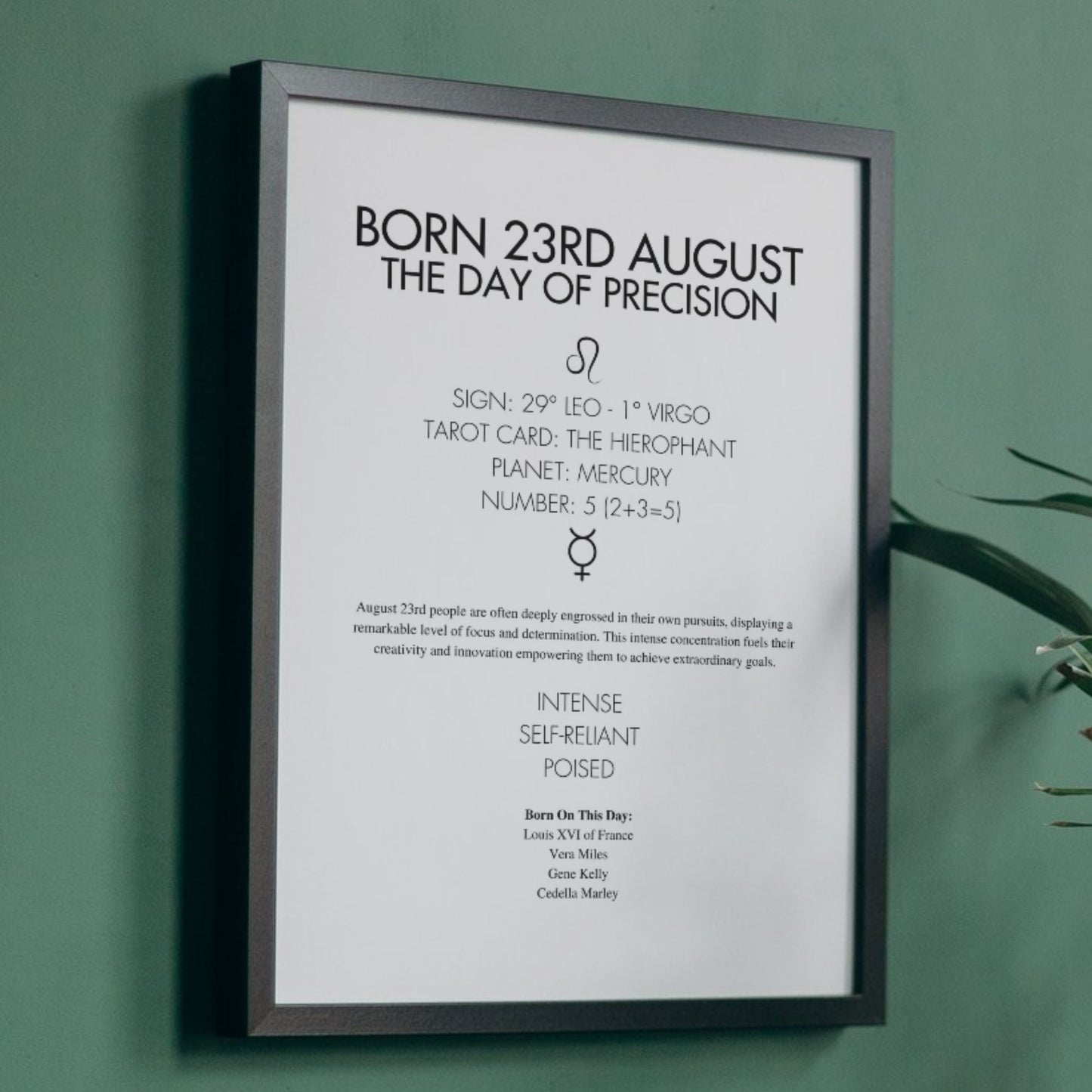 Black framed poster with text about being born on the 23rd of August, including astrological and psychological insights. On a green wall.