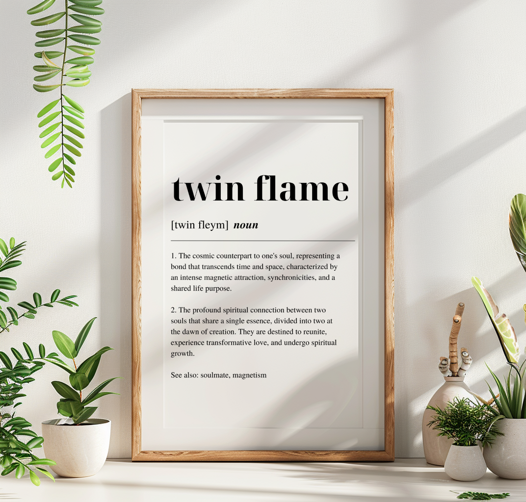 Wooden framed poster with inspirational definition art text for the word and meaning of Twin Flame. The frame is surrounded by plants in vases