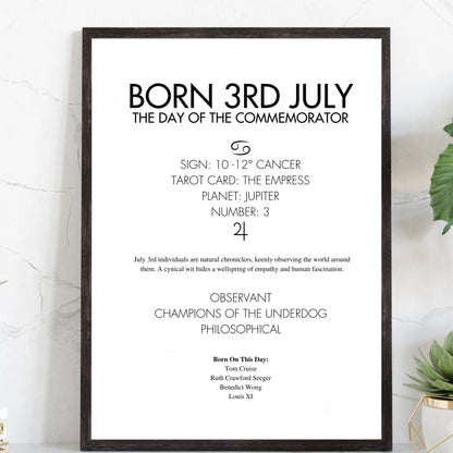 Black framed poster with text about being born on the 3rd of July, including astrological and psychological insights.